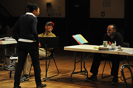 Ensemble Member Alana Arenas talks with Director Timothy Douglas and Assistant Director Terrence Mosley
