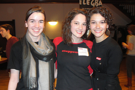 Senior Young Adult Council members Claire Orzel, Grace McQueeny and Maria Maia arrive in Yondorf Hall for the party.