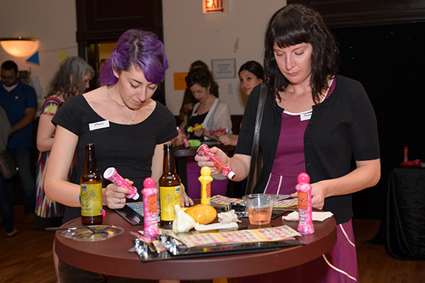 Guests play bingo at the EXPLORE: <i>Grand Concourse</i> event.