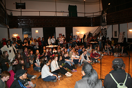 Attendees congregate for a post-show discussion with the cast.