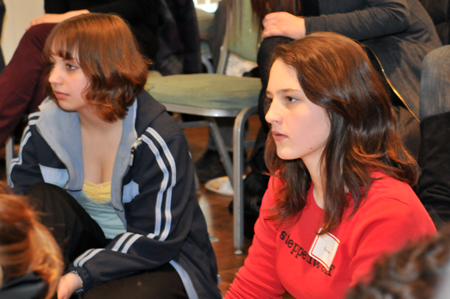 Young Adult Council member Grace McQueeny listens to the actors speak about the Separate Peace rehearsal process.