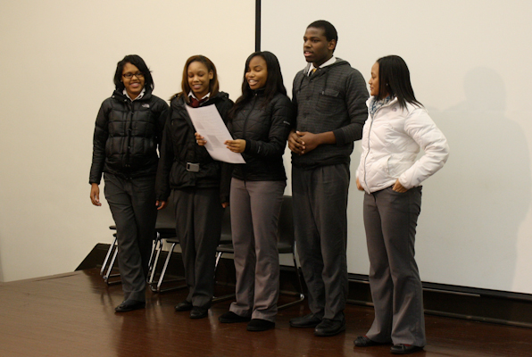 Students perform original poetry during a post-show workshop exploring fears and solutions around youth violence 