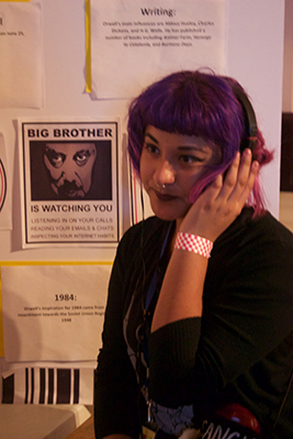 A guest experiences the sounds of <i>1984</i> in a simulated Room 101