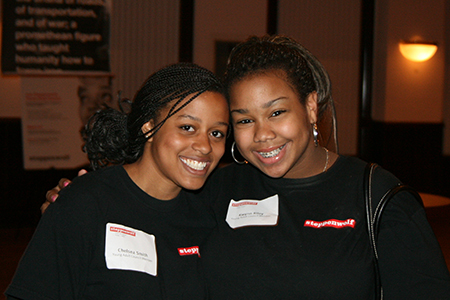First-year Young Adult Council members Chelsea Smith and Kwynn Riley celebrate the success of the night.