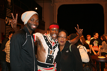Steppenwolf ensemble member and playwright of The Brother Sister Plays Tarell Alvin McCraney poses for a picture with a member of Muntu Dance Theater and actress Jacqueline Williams (Aunt Elegua).
