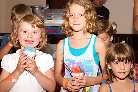 Kids and parents alike getting in on the Block Party snow-cone action