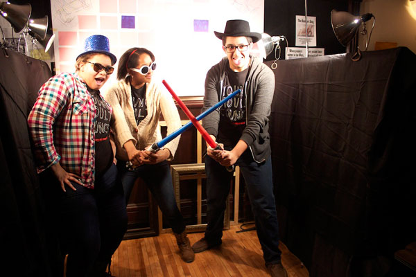 Young Adult Council members pose in the DIY-photo booth.